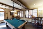 Red Hawk Lodge common area with pool table and tv